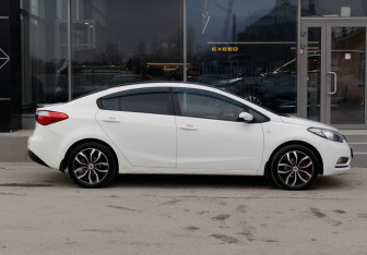 Подержанный автомобиль Kia Cerato Sedan 2013 года (4 фото)