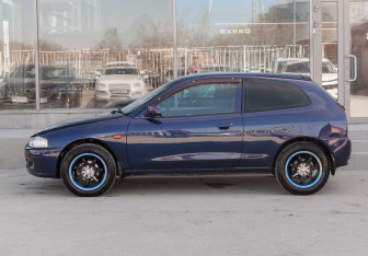 Подержанный автомобиль Mitsubishi Mirage Hatchback 1997 года (9 фото)
