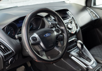 Подержанный автомобиль Ford Focus Hatchback 2011 года (11 фото)