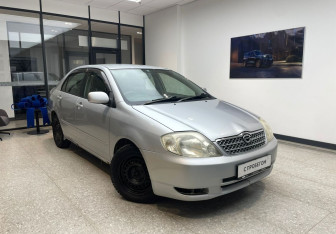 Подержанный автомобиль Toyota Corolla Sedan 2003 года (4 фото)