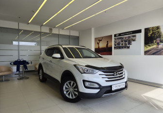 Подержанный автомобиль Hyundai Santa Fe 2015 года (3 фото)