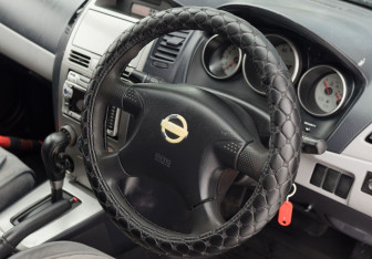 Подержанный автомобиль Nissan Wingroad 2002 года (10 фото)