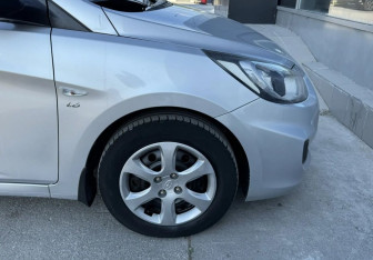 Подержанный автомобиль Hyundai Solaris Sedan 2013 года (12 фото)