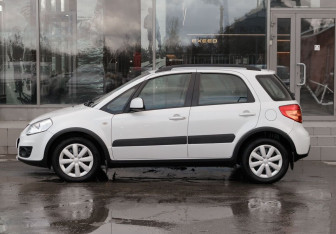 Подержанный автомобиль Suzuki SX4 Sedan 2013 года (8 фото)