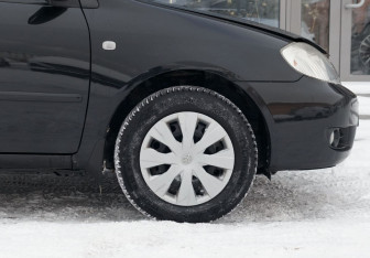 Подержанный автомобиль Toyota Corolla Sedan 2005 года (9 фото)