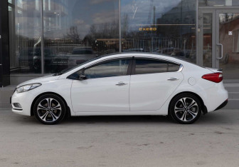 Подержанный автомобиль Kia Cerato Sedan 2013 года (8 фото)