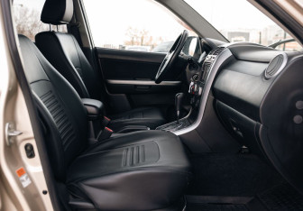 Подержанный автомобиль Suzuki Grand Vitara 2010 года (19 фото)