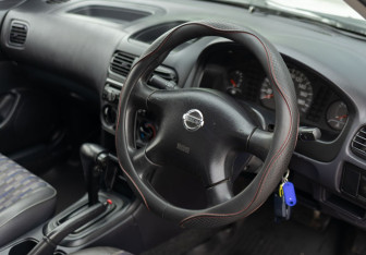 Подержанный автомобиль Nissan AD 2003 года (11 фото)