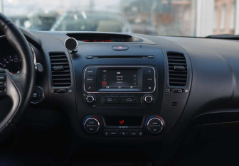 Подержанный автомобиль Kia Cerato Sedan 2013 года (14 фото)