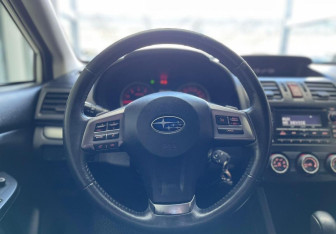 Подержанный автомобиль Subaru XV 2014 года (12 фото)