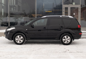 Подержанный автомобиль Peugeot 4007 2012 года (8 фото)