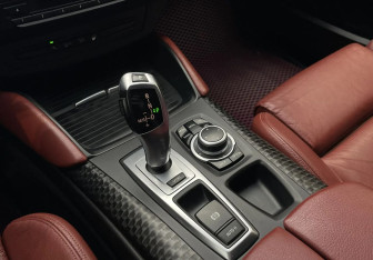 Подержанный автомобиль BMW X6 2013 года (13 фото)