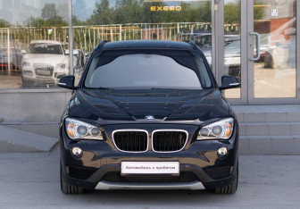 Подержанный автомобиль BMW X1 2013 года (2 фото)