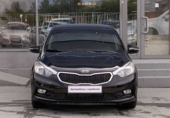Подержанный автомобиль Kia Cerato Sedan 2013 года (2 фото)