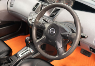 Подержанный автомобиль Nissan Primera Sedan 2001 года (11 фото)