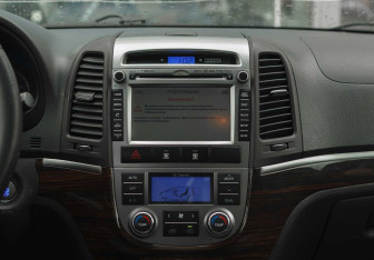 Подержанный автомобиль Hyundai Santa Fe 2012 года (14 фото)