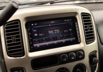 Подержанный автомобиль Ford Maverick 2002 года (13 фото)