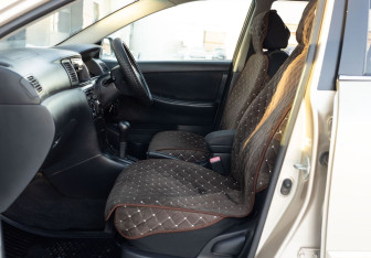 Подержанный автомобиль Toyota Allex 2003 года (18 фото)