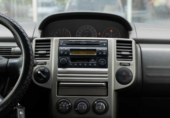 Подержанный автомобиль Nissan X-Trail 2005 года (14 фото)