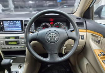 Подержанный автомобиль Toyota Corolla Hatchback 2005 года (9 фото)