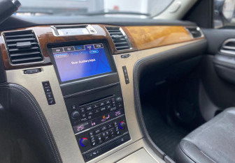 Подержанный автомобиль Cadillac Escalade Suv 2012 года (12 фото)