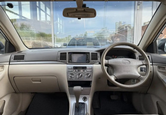 Подержанный автомобиль Toyota Corolla Wagon 2004 года (10 фото)