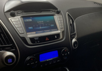 Подержанный автомобиль Hyundai ix35 2011 года (8 фото)