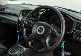 Подержанный автомобиль Subaru Legacy Wagon 2000 года (11 фото)