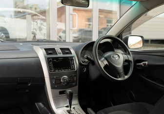 Подержанный автомобиль Toyota Corolla Wagon 2007 года (10 фото)