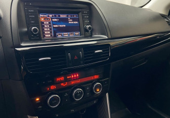 Подержанный автомобиль Mazda CX-5 2011 года (9 фото)