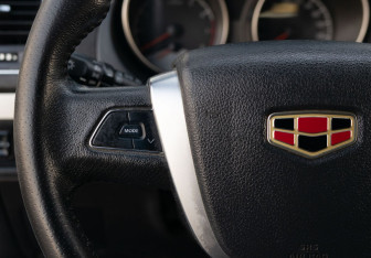 Подержанный автомобиль Geely Emgrand X7 2016 года (12 фото)