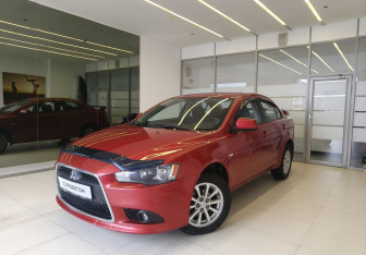 Подержанный автомобиль Mitsubishi Lancer Sedan 2012 года (1 фото)