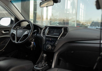 Подержанный автомобиль Hyundai Santa Fe 2016 года (10 фото)