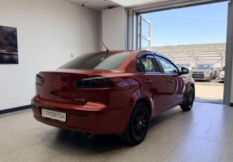 Подержанный автомобиль Mitsubishi Lancer Sedan 2012 года (7 фото)