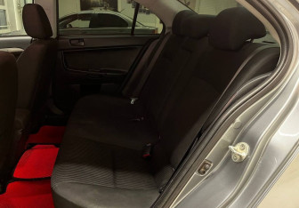 Подержанный автомобиль Mitsubishi Lancer Sedan 2013 года (15 фото)