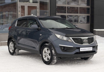 Подержанный автомобиль Kia Sportage 2014 года (3 фото)