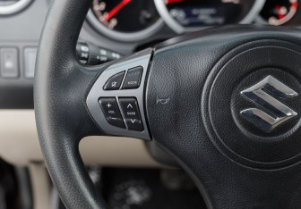 Подержанный автомобиль Suzuki Grand Vitara 2013 года (12 фото)