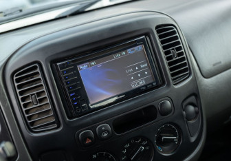 Подержанный автомобиль Ford Escape 2005 года (13 фото)