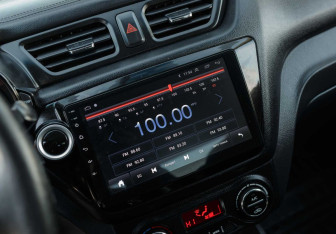 Подержанный автомобиль Kia Rio Sedan 2014 года (14 фото)