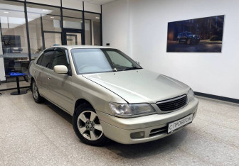 Подержанный автомобиль Toyota Corona Sedan 1999 года (3 фото)