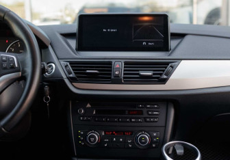 Подержанный автомобиль BMW X1 2013 года (14 фото)