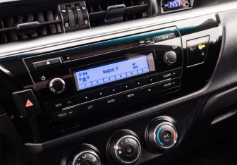 Подержанный автомобиль Toyota Corolla Sedan 2013 года (14 фото)