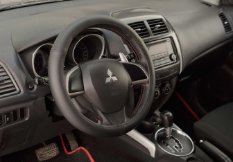 Подержанный автомобиль Mitsubishi ASX 2013 года (11 фото)