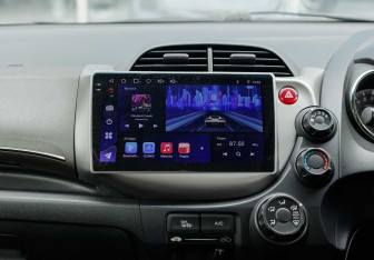 Подержанный автомобиль Honda Fit Shuttle 2014 года (13 фото)