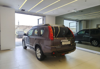 Подержанный автомобиль Nissan X-Trail 2010 года (6 фото)