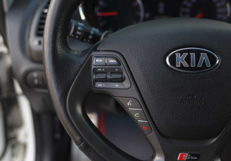 Подержанный автомобиль Kia Cerato Sedan 2013 года (12 фото)
