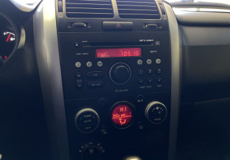 Подержанный автомобиль Suzuki Grand Vitara 2010 года (13 фото)