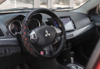Подержанный автомобиль Mitsubishi Lancer Sedan 2008 года (11 фото)