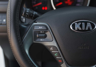 Подержанный автомобиль Kia Rio Sedan 2015 года (12 фото)