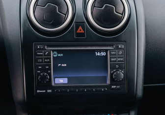 Подержанный автомобиль Nissan Qashqai+2 2013 года (14 фото)